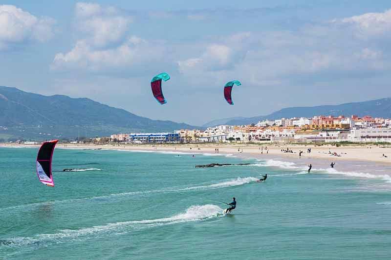 Tarifa, Cadiz Province, Costa de la Luz, Andalusia, southern Spain.  Kitesurfing off Playa de los Lances.